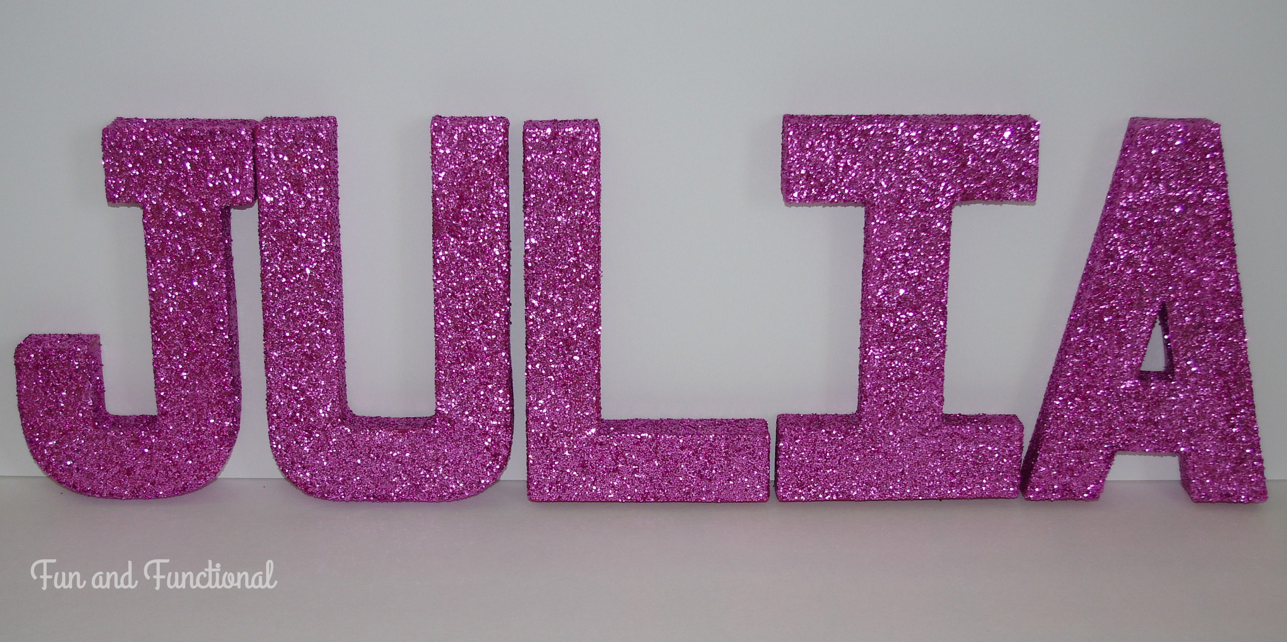 Easy DIY pink glitter letters.